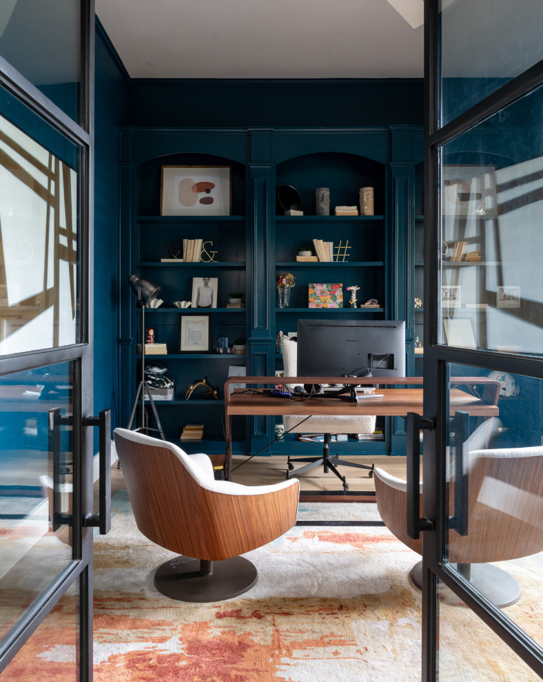 Elegant Contemporary Office: Blue Walls, Glass Light & Plush Seating