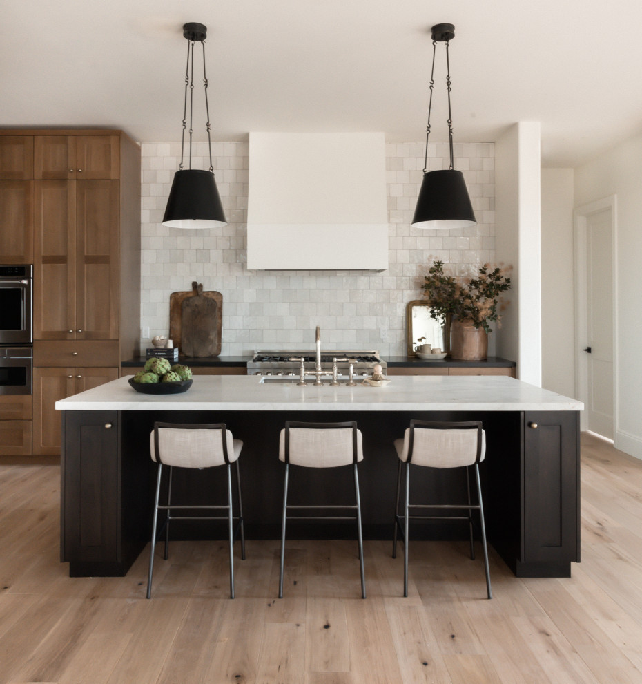 Modern Open-Concept Kitchen with Island & Black Pendant Lights