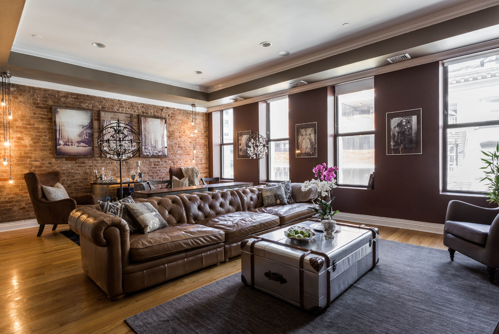 Sun-Kissed Industrial Living Room: Exposed Brick & Cozy Tufted Seating