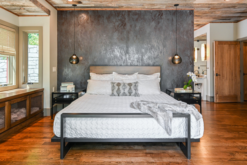 Industrial-Rustic Bedroom with Dark Accent Wall & Wooden Floors