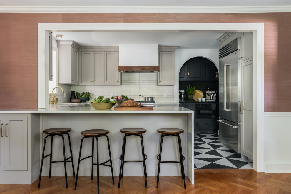 Modern Open Kitchen Island with Bar Stools & Geometric Flooring