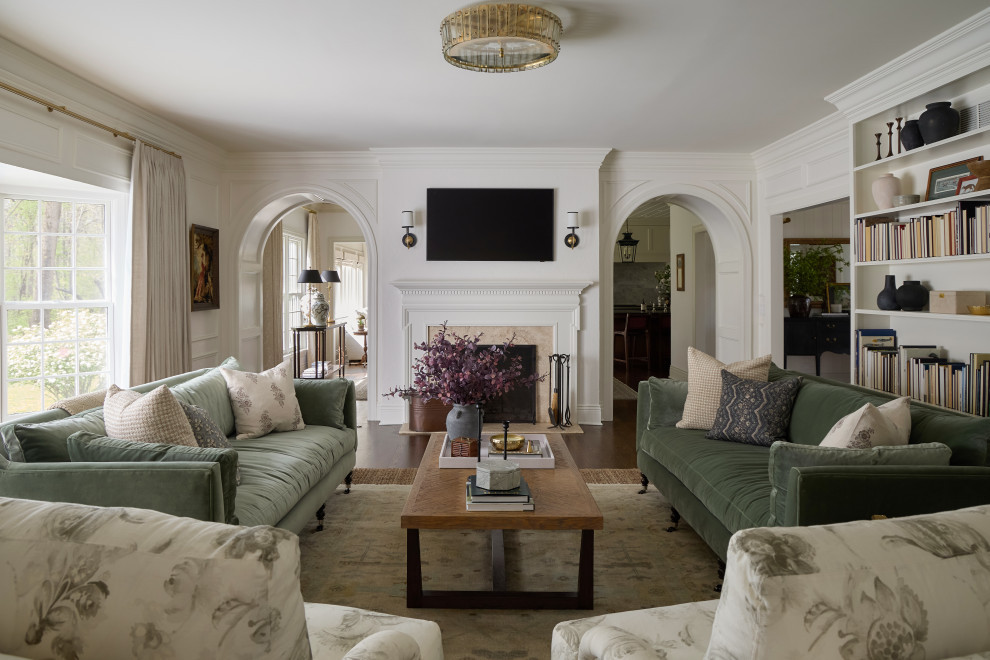 Charming Traditional Living Room Featuring Plush Seating & Warm Ambiance