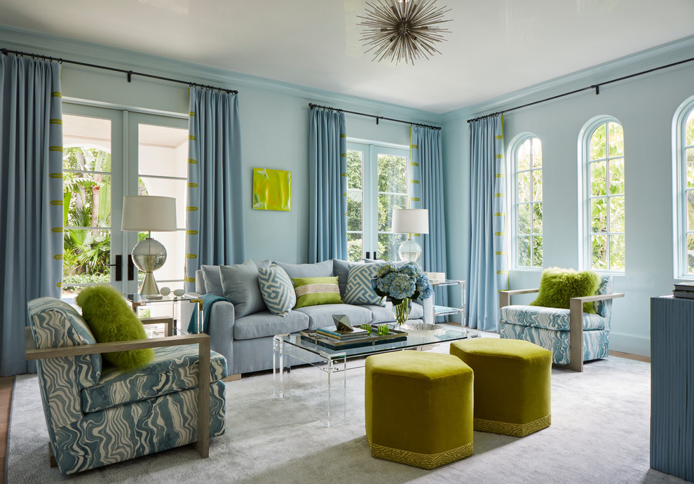 Sunlit Contemporary Living Room with Blue Hues & Vibrant Accents